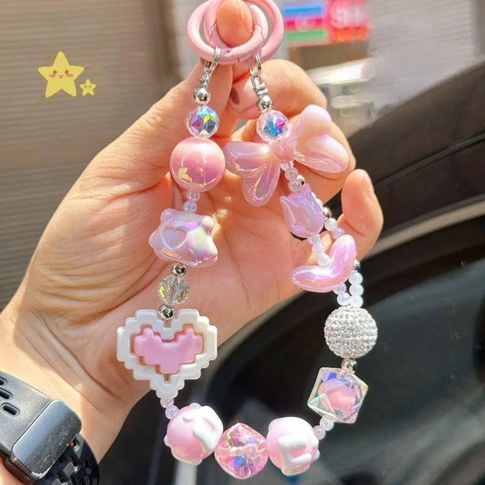 Multi-color Kawaii XP Gain Keychain with fun charms and dreamy iridescent details for cutecore lovers