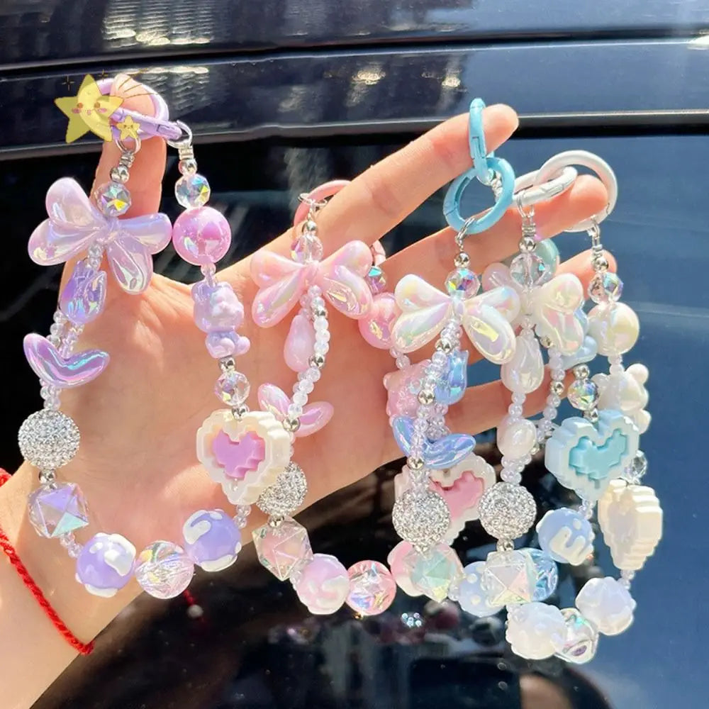 Kawaii XP Gain Keychain in pastel blue with hearts, teddies, and geometric charms for cutecore vibes