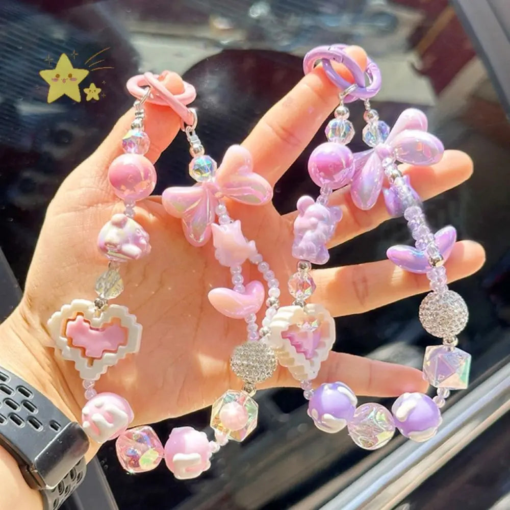 Pastel pink Kawaii XP Gain Keychain with playful charms, perfect for DDLG/ABDL littles
