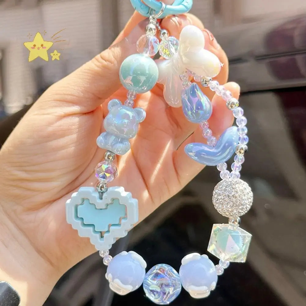 Cute pastel white Kawaii XP Gain Keychain with hearts, teddies, and geometric shapes