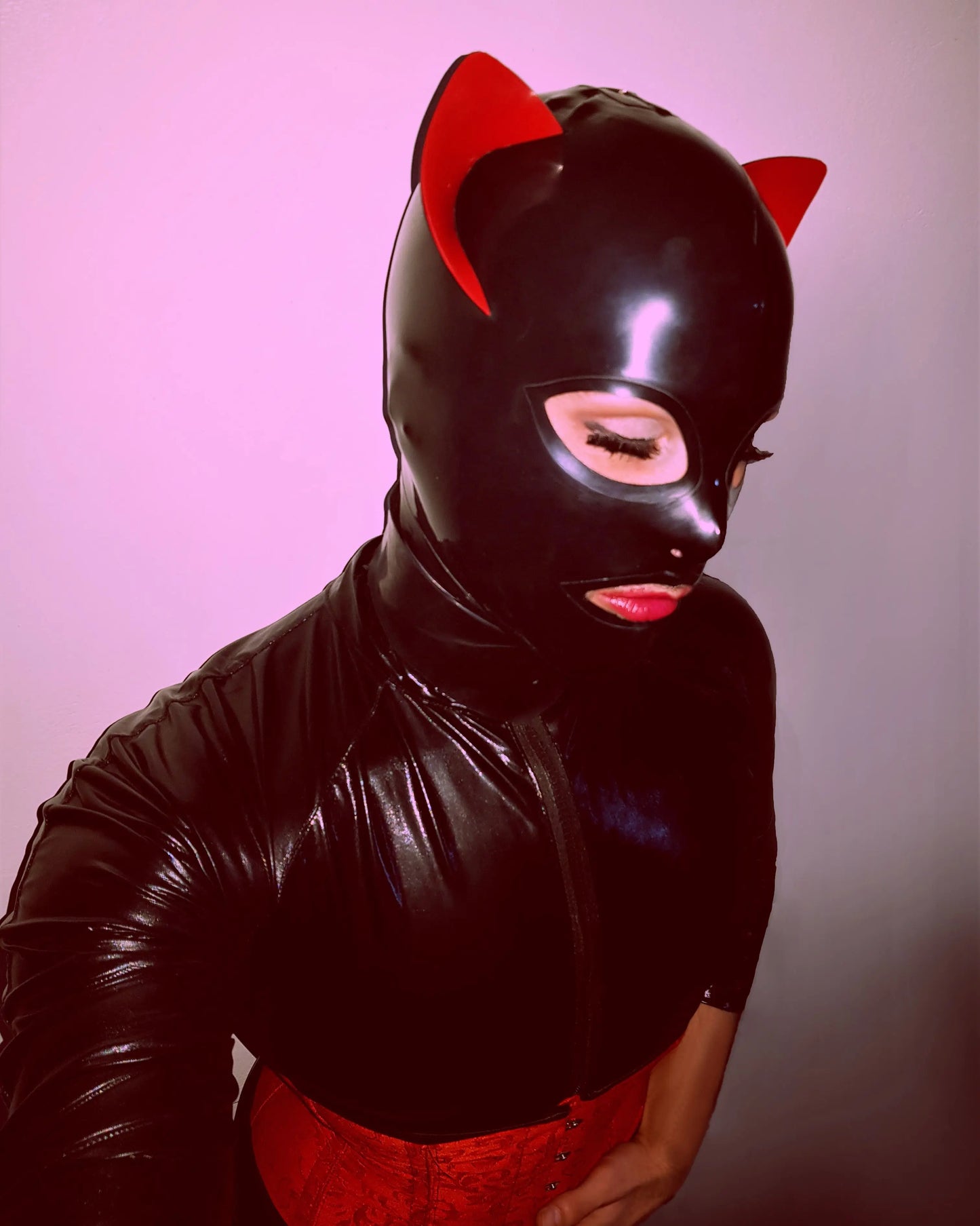 Front view of Latex Feline Play Mask, red ears & black mask, playful and edgy roleplay vibes