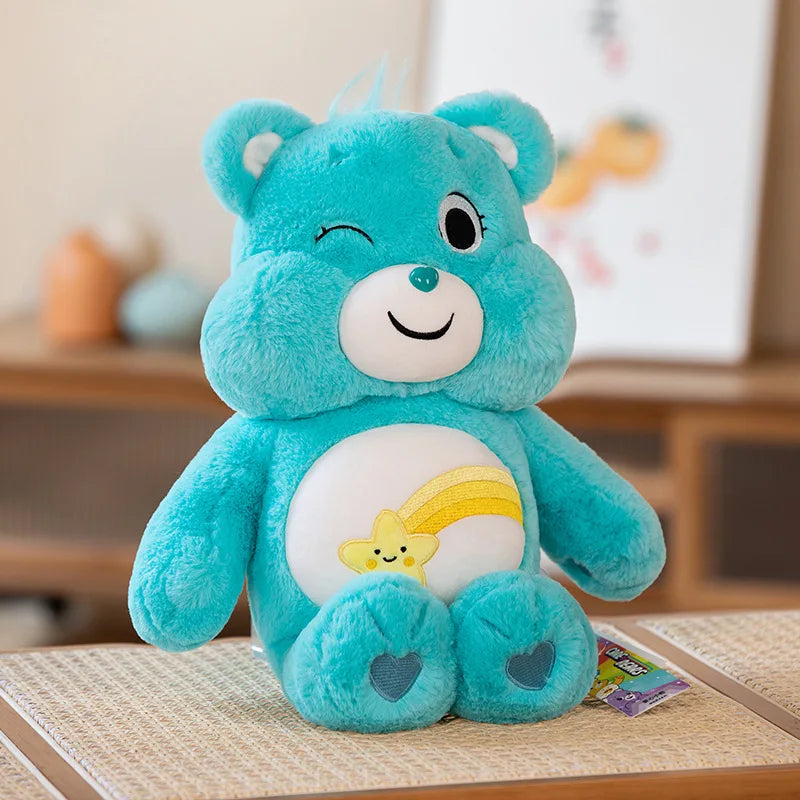 Light blue Rainbow Friends plush bear with cute winking face and cuddly feel