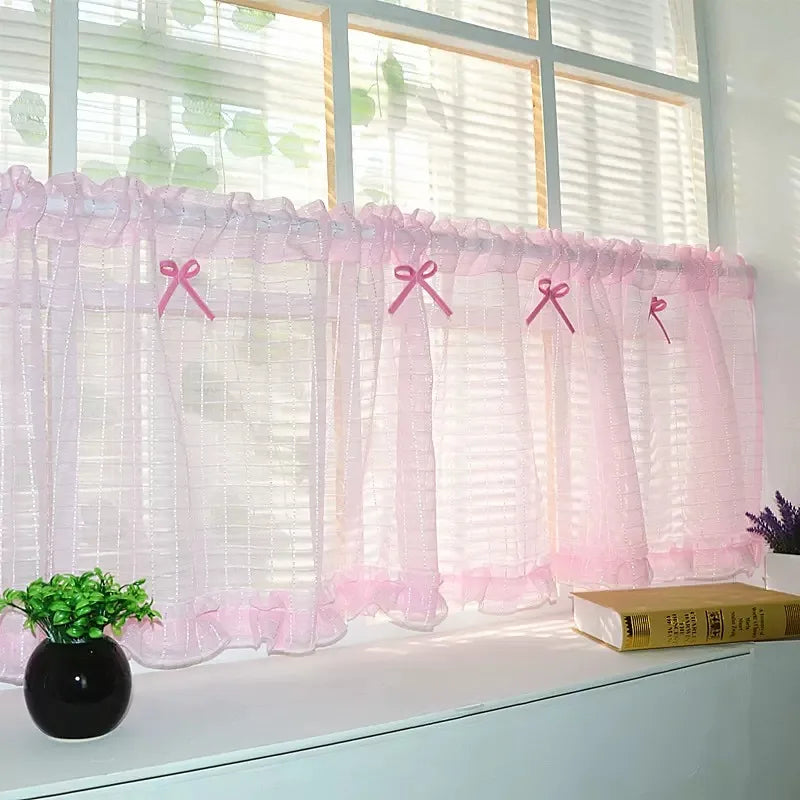 Light pink princess tulle drapes made of sheer fabric, perfect for kitchens, cabinets, and small spaces