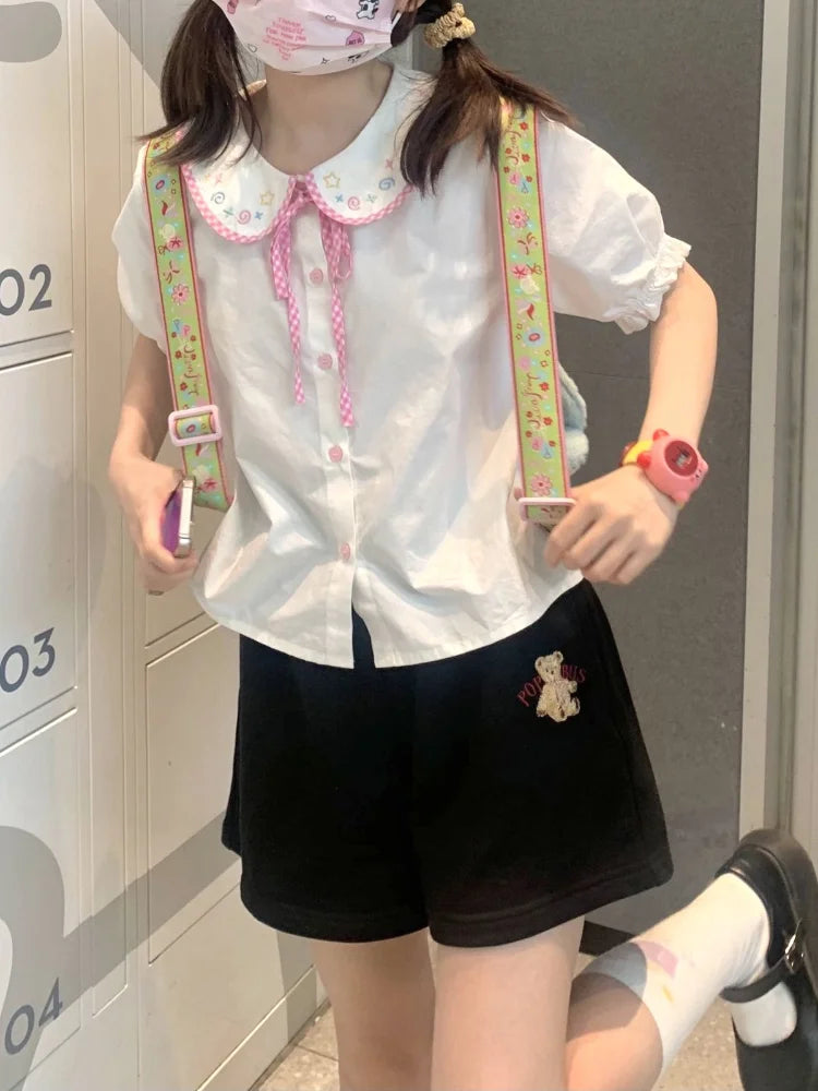 Lightweight preppy plaid doll blouse with lace ribbon accents, perfect for streetwear and cozy layering