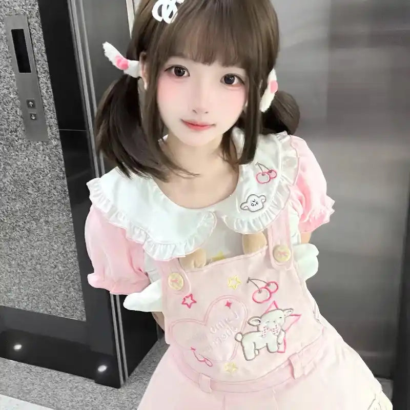 Close-up of sheep motif on pastel outfit showcasing cozy and playful kawaii details