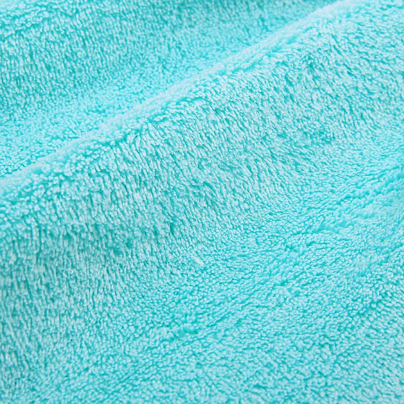 close-up of blue Elephant cartoon hand towel showing soft texture and kawaii blushy face for little space and ABDL play