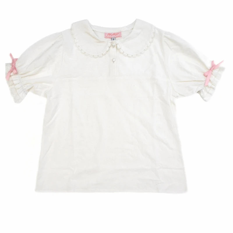 Lolita Bunnycore strawberry dress in pink featuring breathable fabric, puff sleeves, and playful ruffles