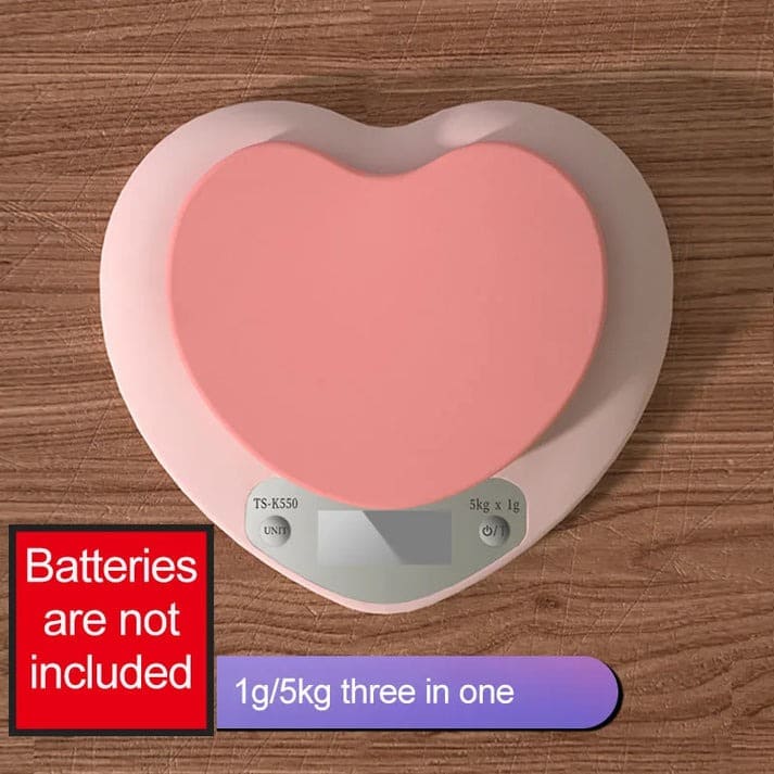 Pink heart-shaped digital kitchen scale with LCD screen and 5kg capacity for baking and cooking precision