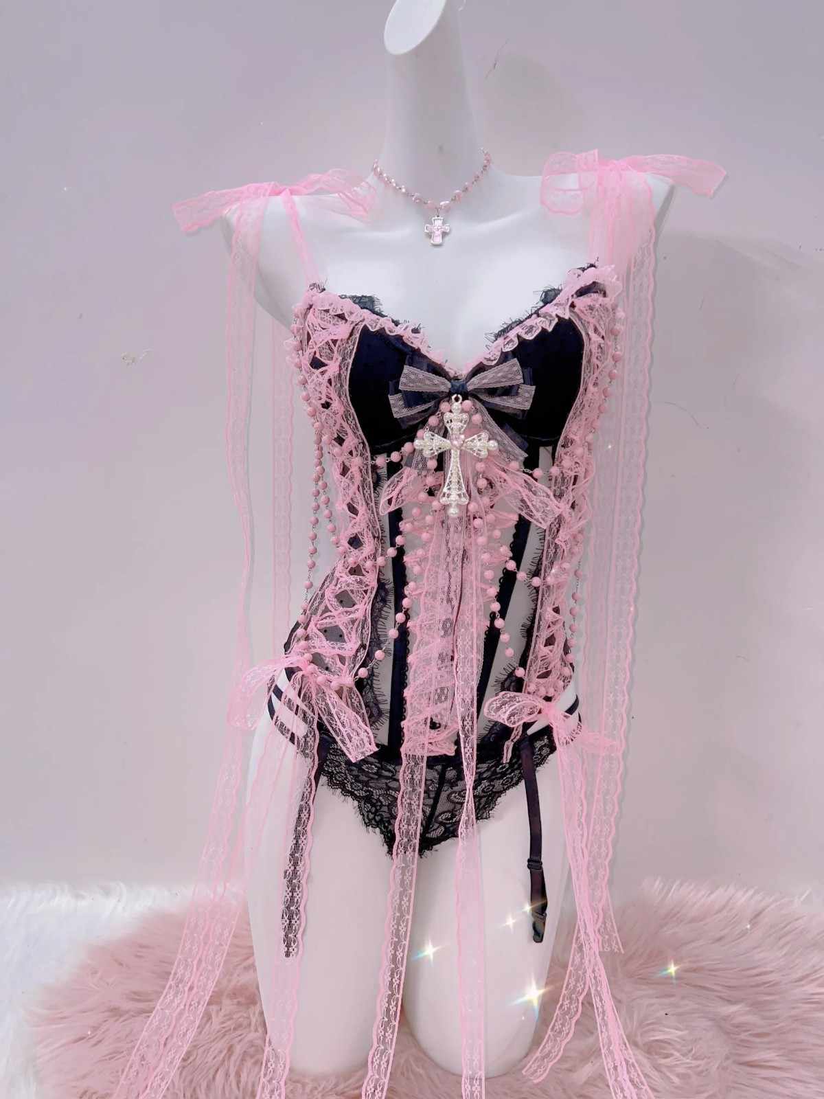 Majestic soft pink lace lingerie with stretch comfort and queen-inspired boudoir styling.