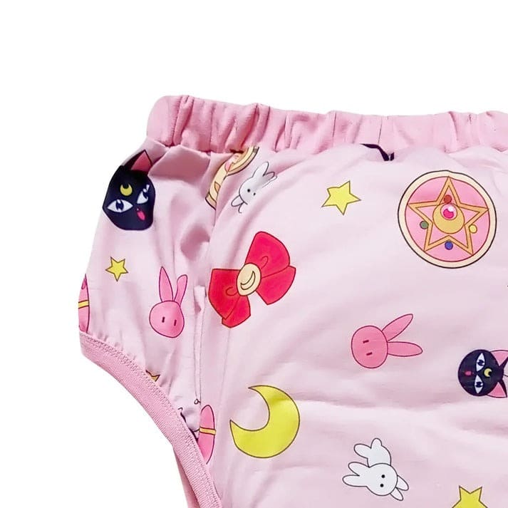 Soft pink DDLG training pants with dreamy celestial prints and secure, elastic fit for daily or playtime use