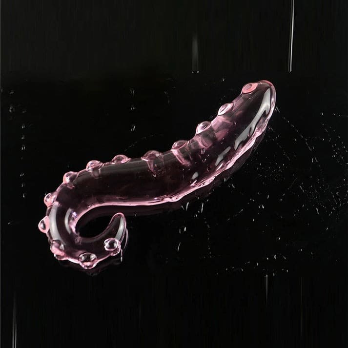 Pink crystal glass wand with raised tentacle texture for fantasy-inspired vaginal or anal play and temperature play.