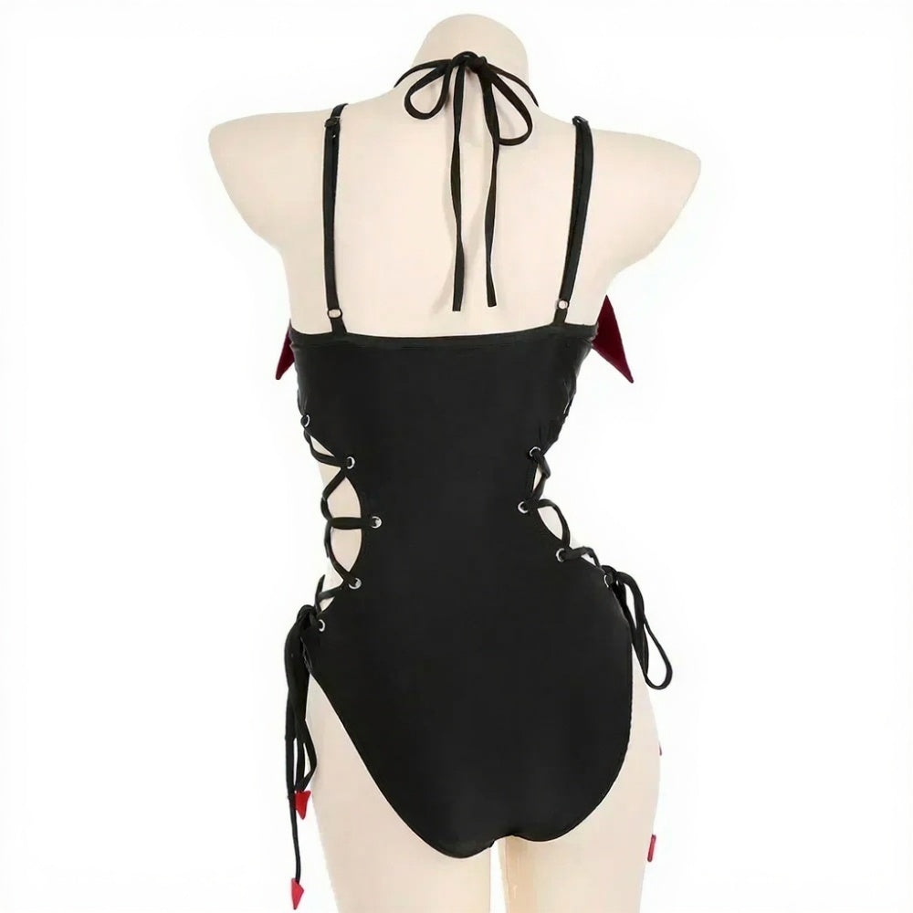 Black gothic bodysuit with bat wings, lace-up sides, and dollcore-inspired heart accent
