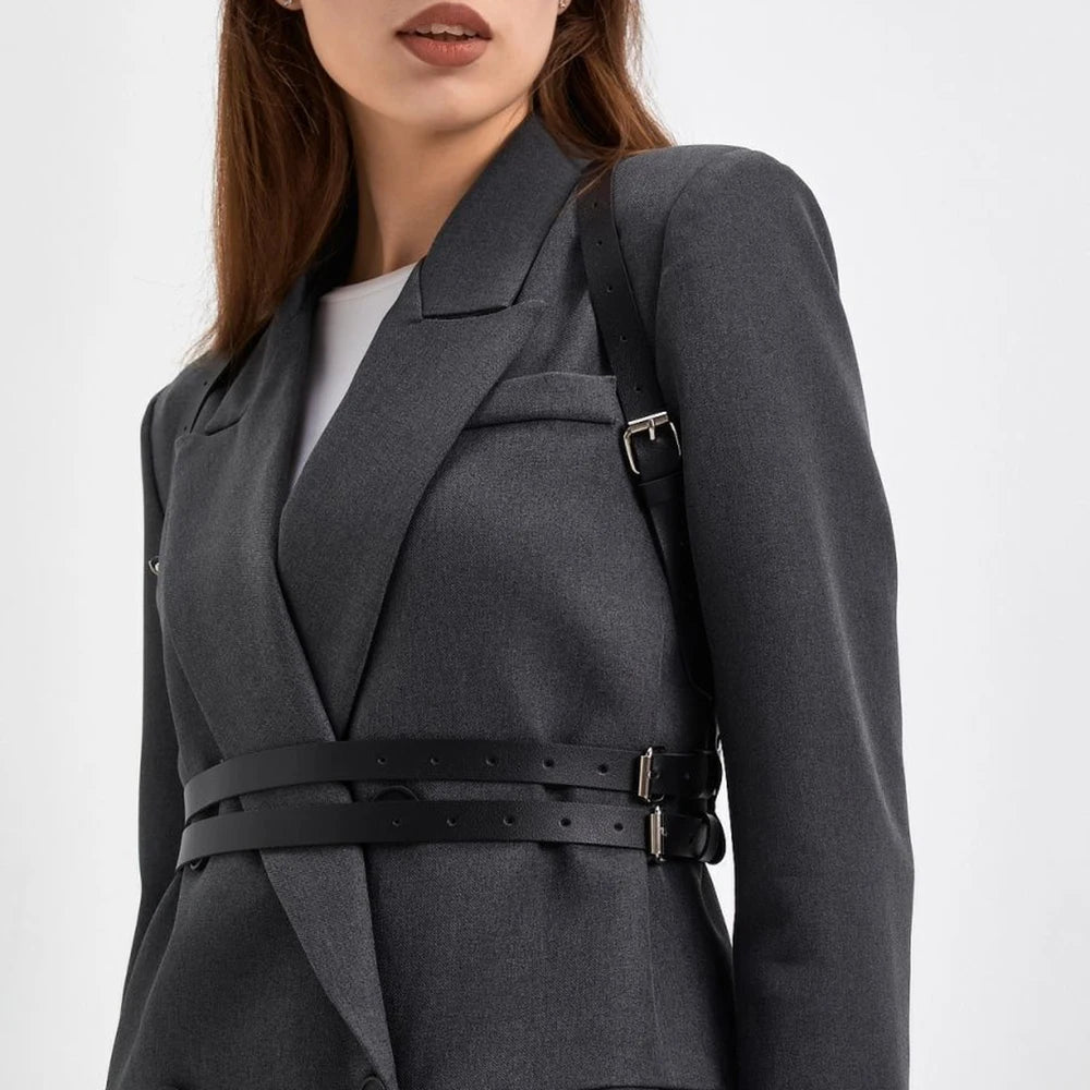 Matte black hardware and smooth leather details combine in the Noir Adjustable Belt Harness for ultimate style