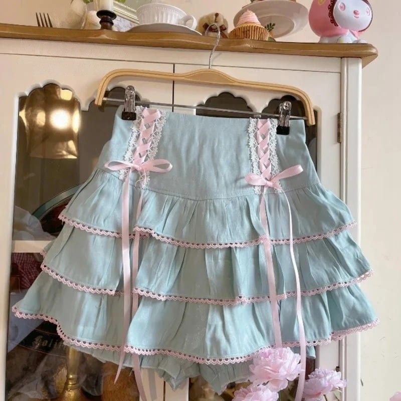 Pastel blue Fairycore Lolita High Waist Ribbon Skirt with kawaii pink ribbon lace-up accents