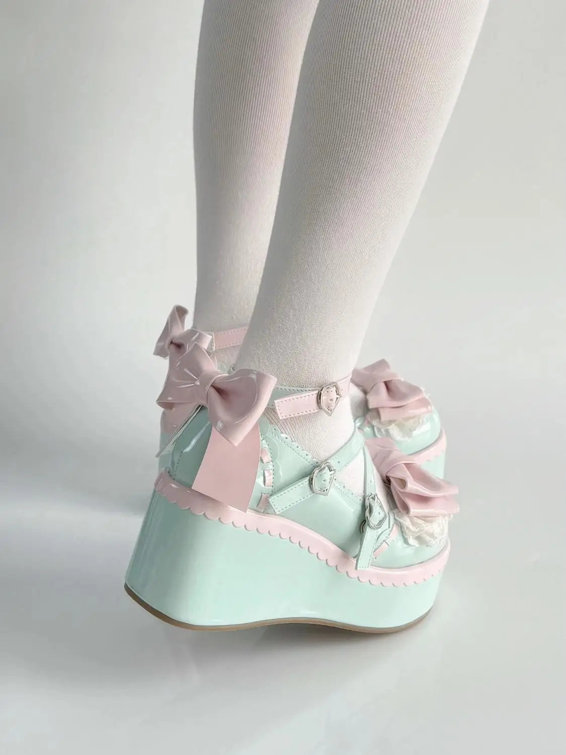 Pastel bubblegum mint lolita platform shoes with chunky heels, bows, and heart buckles for kawaii DDLG ABDL outfits