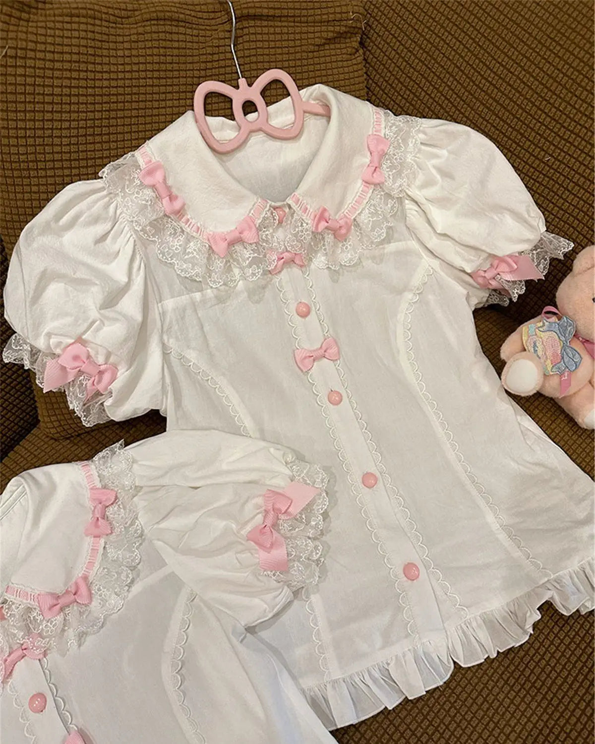 Soft pastel Lolita blouse with Peter Pan collar and delicate feminine accents