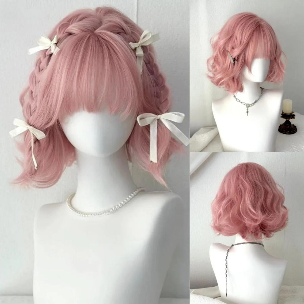Pastel pink bob wig with wavy curls and mesh cap for cute kawaii and little space outfits