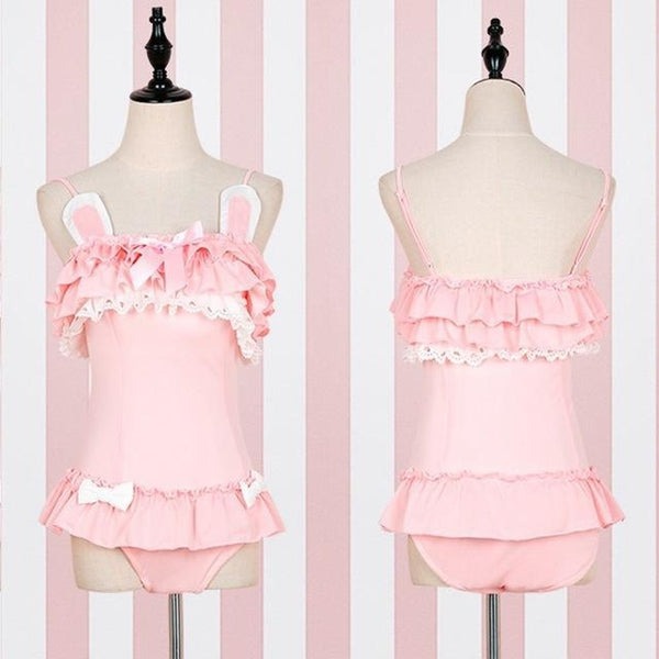 pastel pink bunny play onesie frilly layers with bow accents for whimsical little-space roleplay