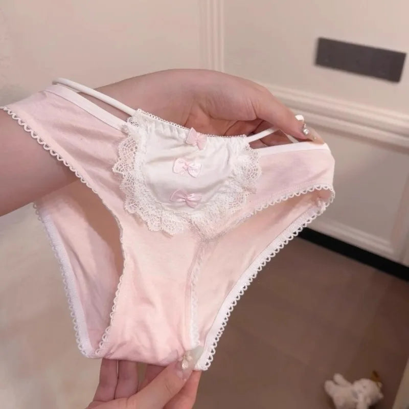 Soft pastel pink lolita panties with mini bows, side ties, and peekaboo back for DDLG ABDL fashion