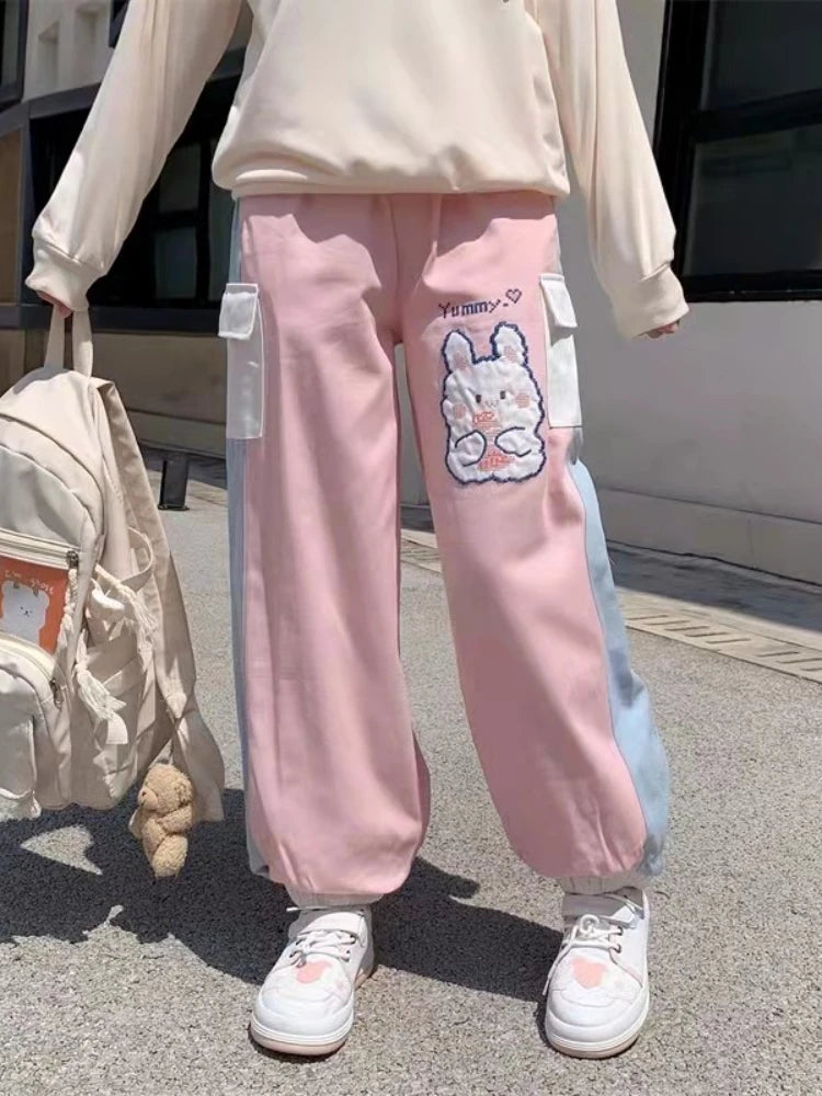 Cute pink bunny sweatpants with candy drip accents, designed for ABDL and kawaii soft fashion lovers