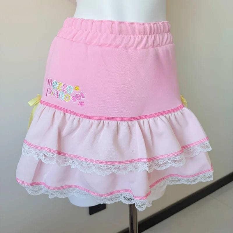 Pink kawaii ruffle skirt with lace trim and soft fabric, ideal for babygirl and soft girl aesthetics