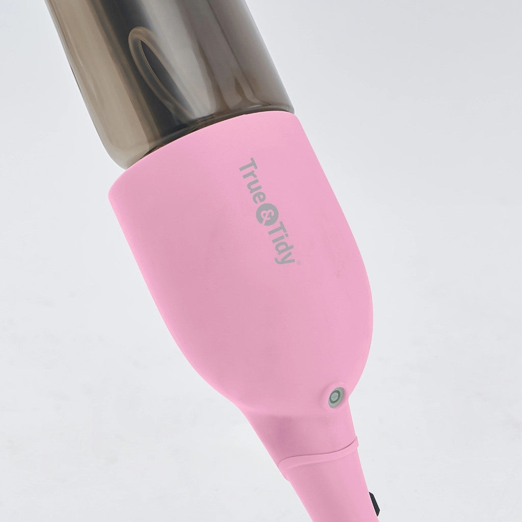 Stylish pink mop with spray action and 360° swivel head for effortless, aesthetic cleaning