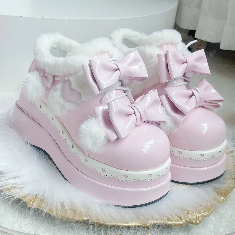 Pink Pom Pom Angel Baby Platform Shoes with heart accents and ribbon details, perfect for kawaii and ABDL fashion