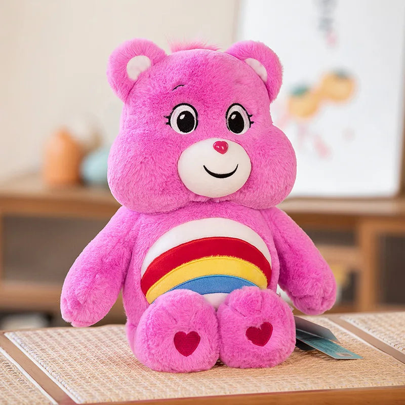 Pink Rainbow Friends plush bear with sweet smiling face and cozy pastel look