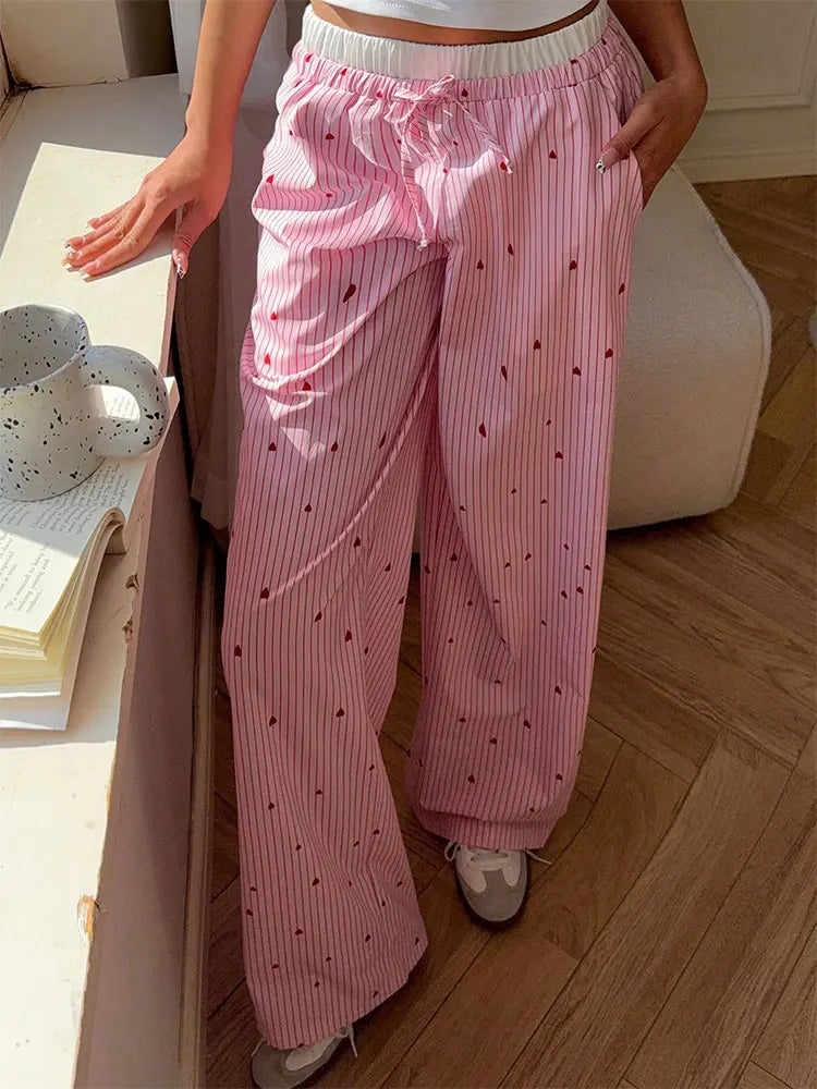 Pastel pink striped lace pants with heart details, flattering slim fit for babycore and ABDL fashion