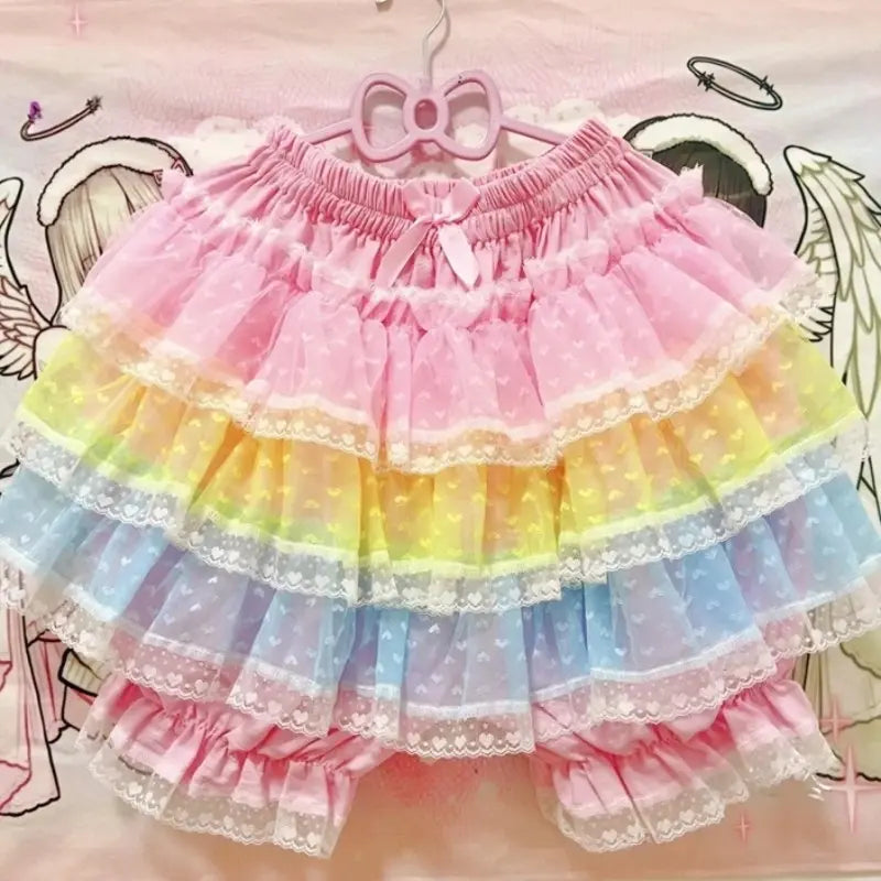Princess Puff Ruffle Mini Skirt in pastel pink, yellow, and blue ruffle layers