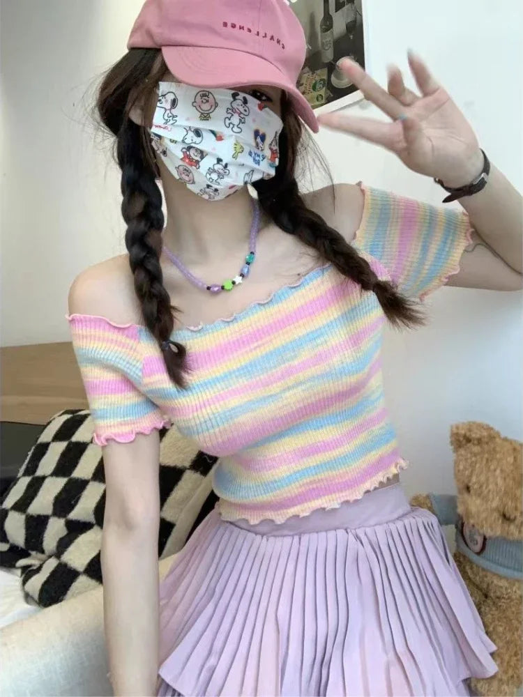 Pastel rainbow off-shoulder crop top, kawaii little space accessory for casual or cosplay looks, cute playful cutecore fashion