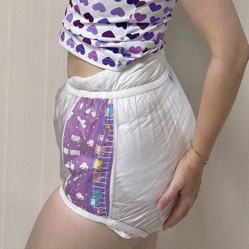 Soft pink Rainbow Muse diaper cover with comfy elastic bands
