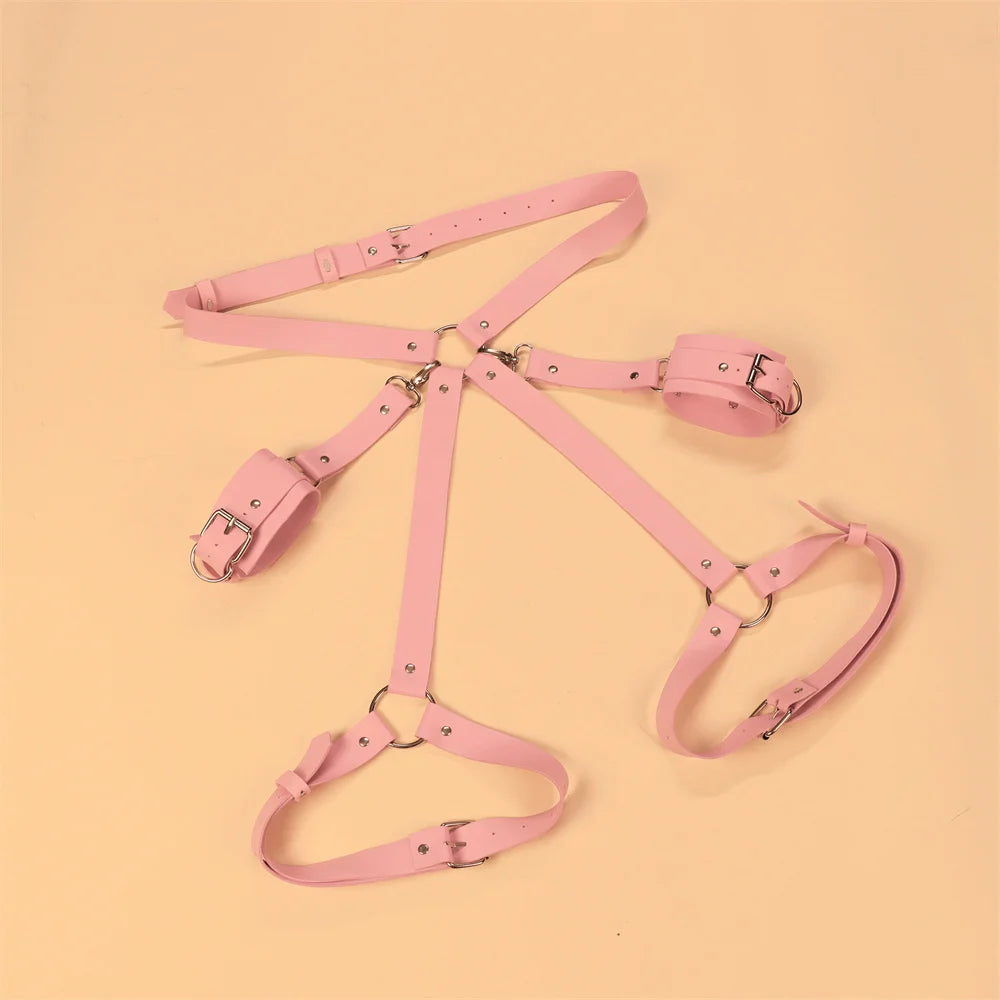 Sexy kawaii adjustable pink wrist-to-thigh harness with durable soft faux leather and handcuff accents