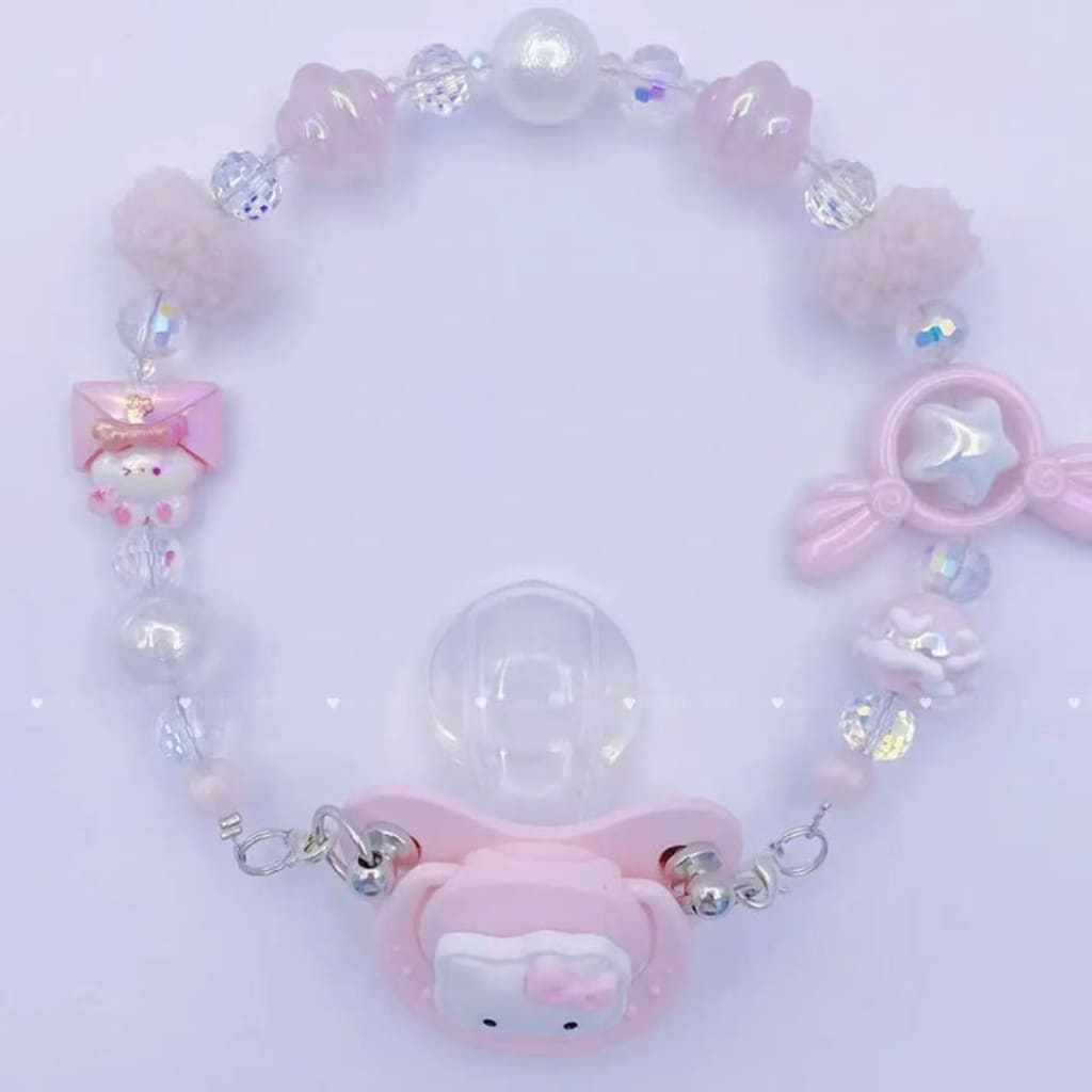 Magic Glow silicone pacifier with cozy wings and star accents for soothing little ones day and night.