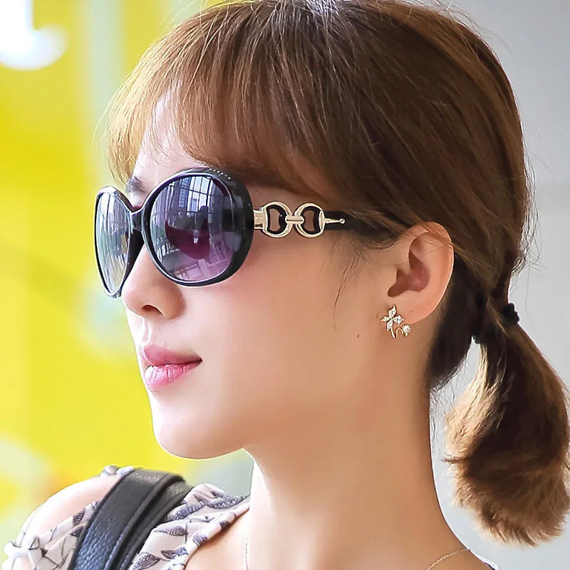 Model wearing Slavic Diva Shades, elegant oval vintage frames with glam gold chain accents for cutecore