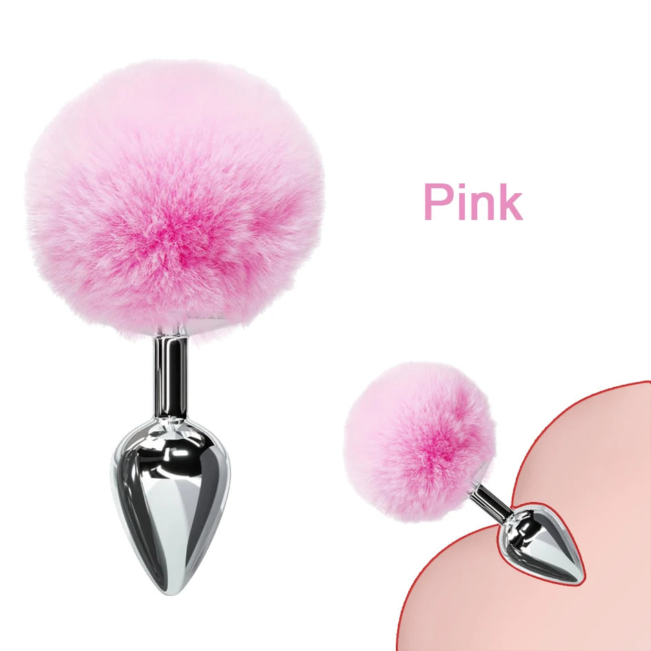 Soft pink bunny tail plug designed for petplay and littlespace with body-safe stainless steel base