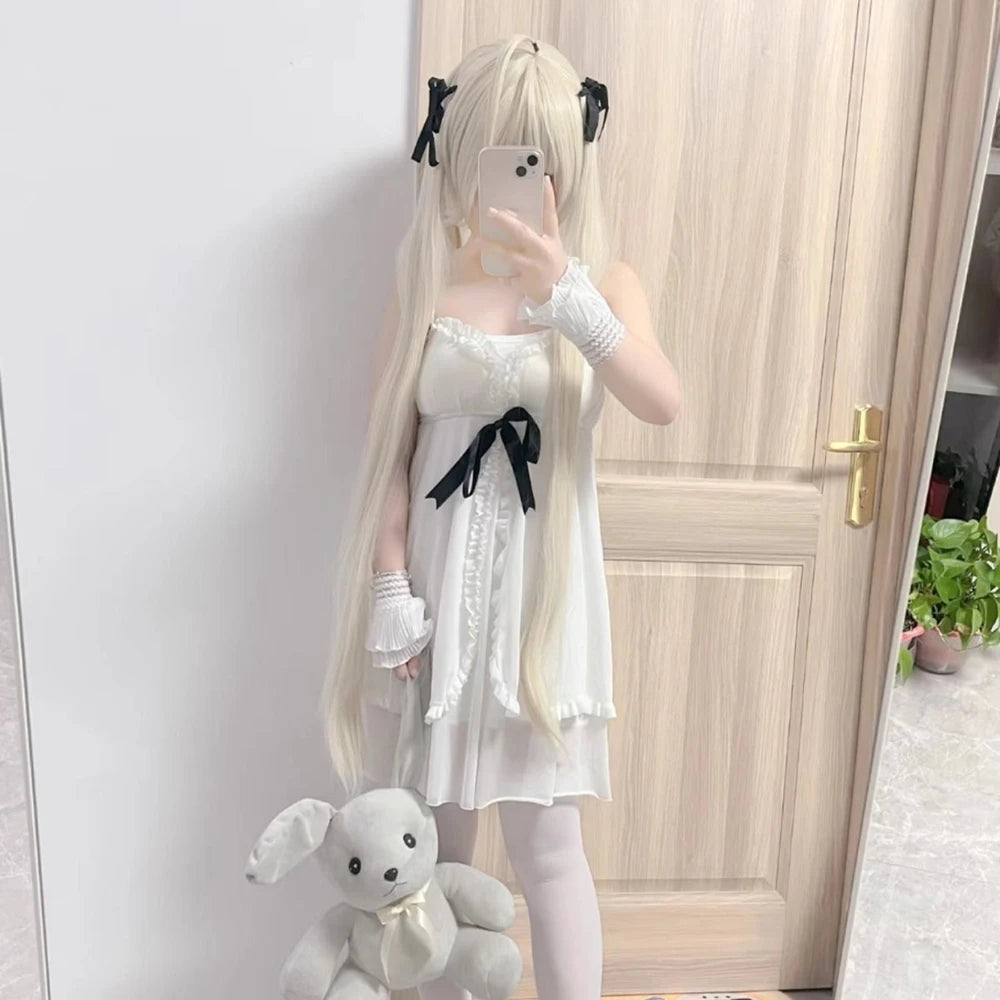 soft pastel Lolita nightdress with layered frills and bows for playful little-space, cutecore, and cozy magical nights