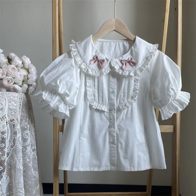 Soft girl chic lolita ruffle blouse with bubble sleeves, ideal for cute layering under dresses or skirts