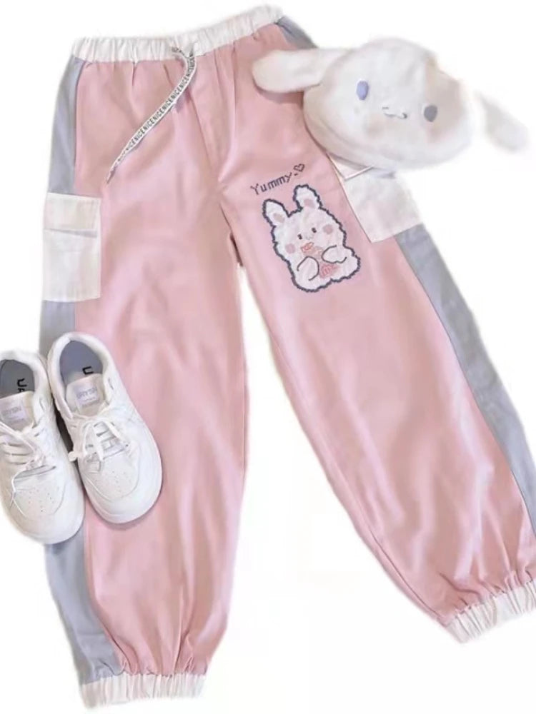 Soft pink candy drip bunny sweatpants designed for kawaii and ABDL babycore comfy looks