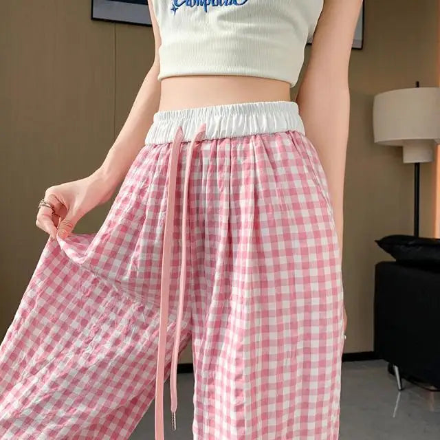 Soft pink plaid pants with flattering flow and pastel vibes for kawaii ddlg fashion