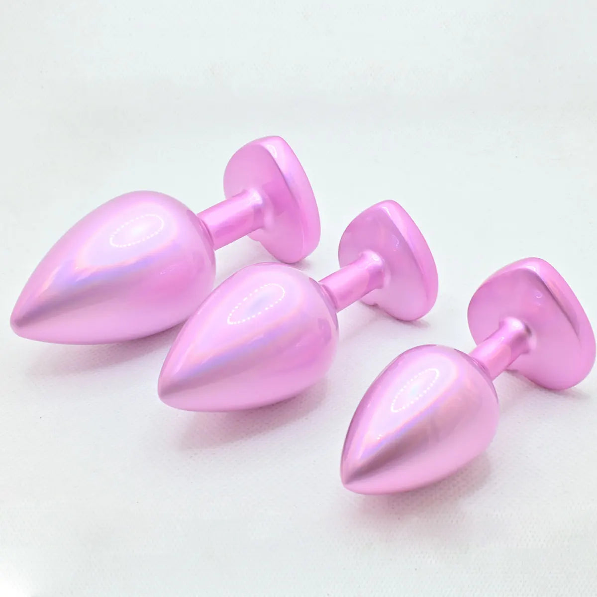 Sparkly holographic pink heart plug for kawaii DDLG lovers, soft silicone and adorable design