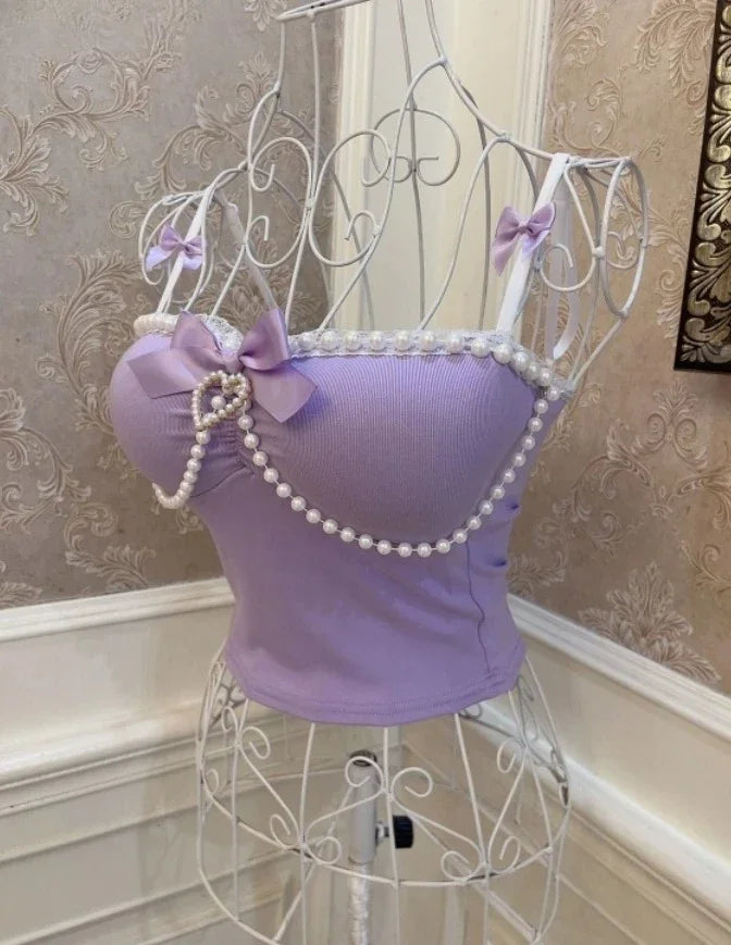 Side view of Spoiled Princess purple pearl detail tank top with lace waves