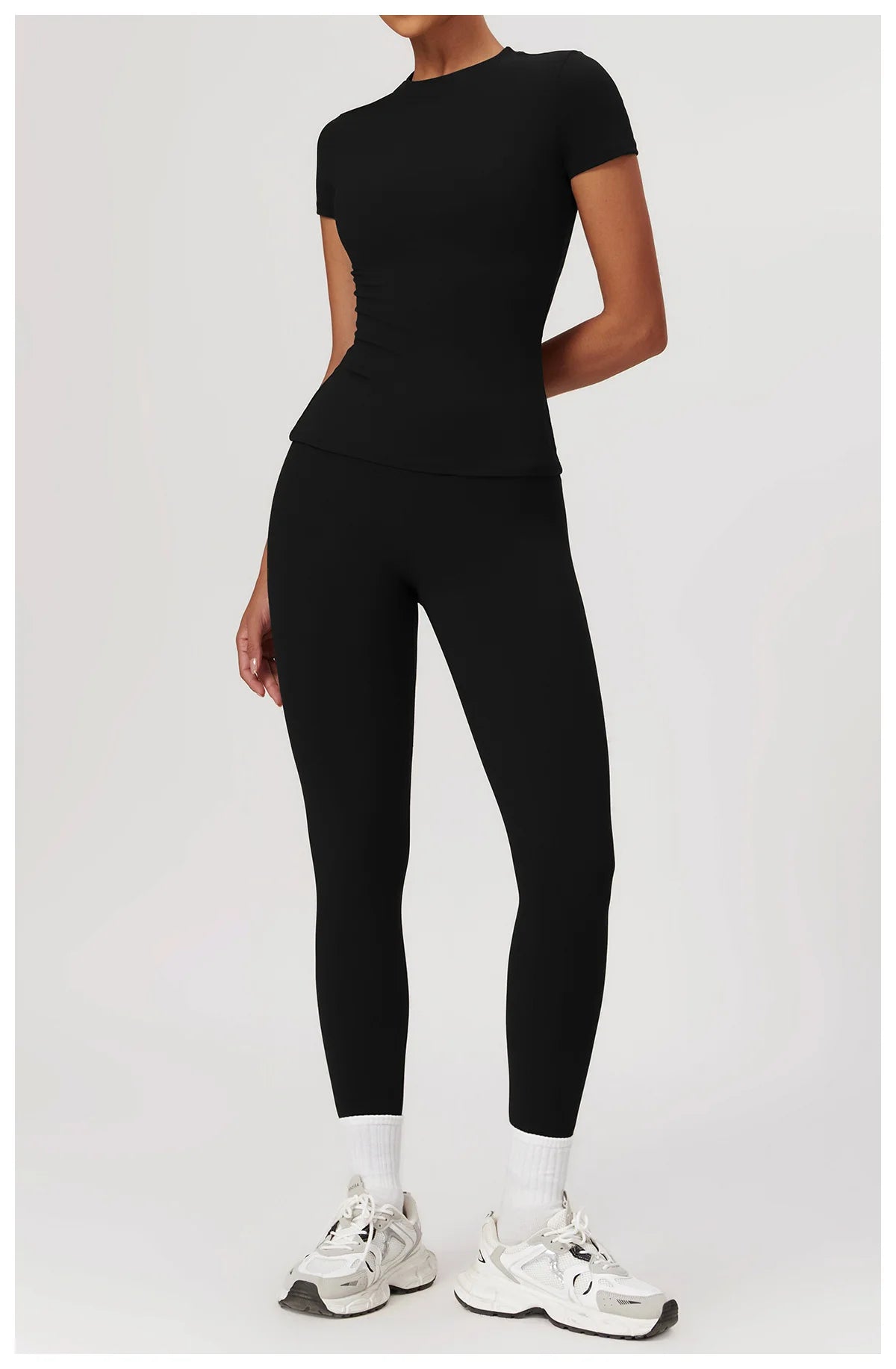 Black babygirl sporty crop top and skirt set, soft nylon spandex fabric for flexible, stylish comfort