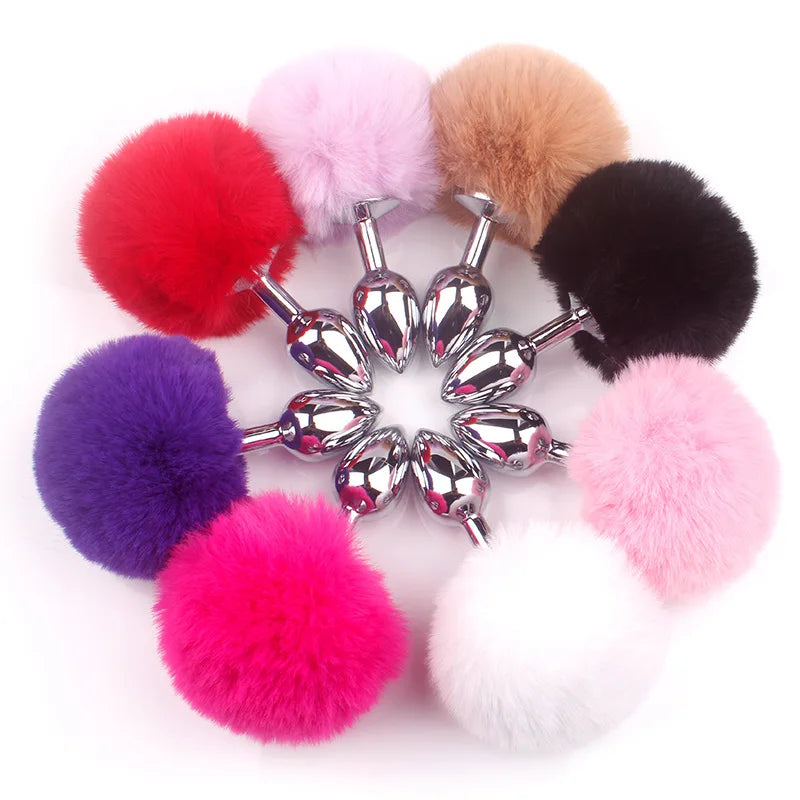 Stainless steel bunny tail plug in pink with fluffy tail for playful petplay and littlespace roleplay