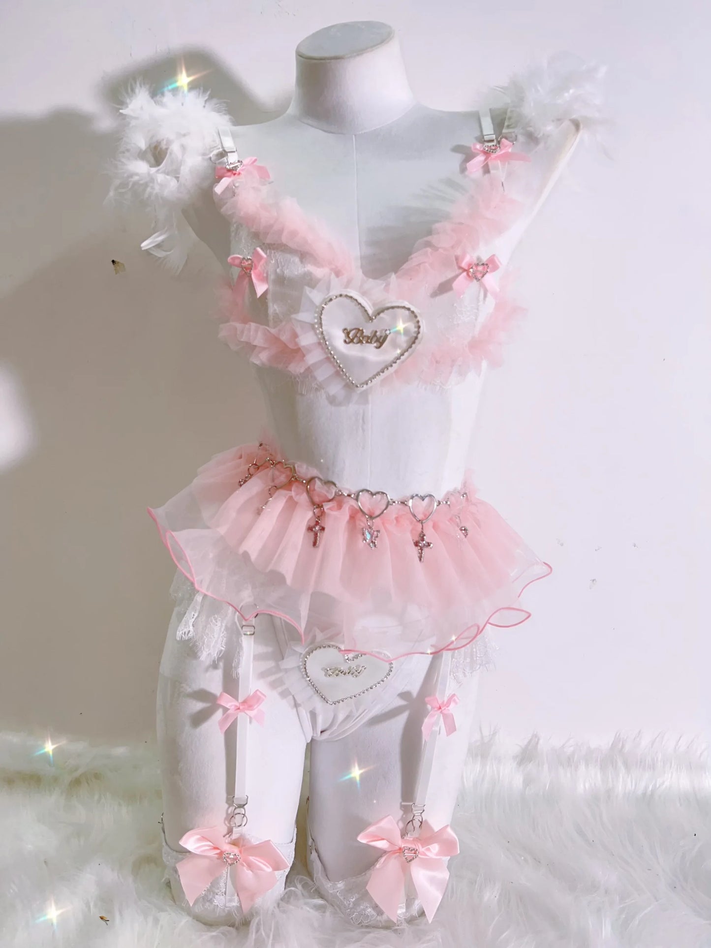 Sugar Baby lingerie set packaging showcasing soft pink color and cute heart details for gifting or storage