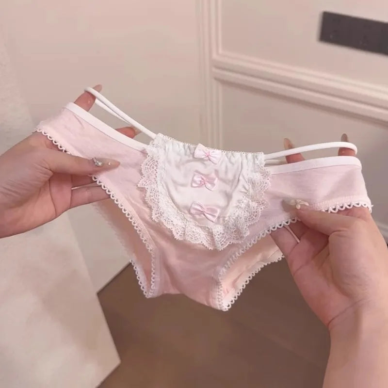 Pastel pink lolita panties with front bows, lace trim, and side ribbons for DDLG ABDL soft girl kawaii fashion