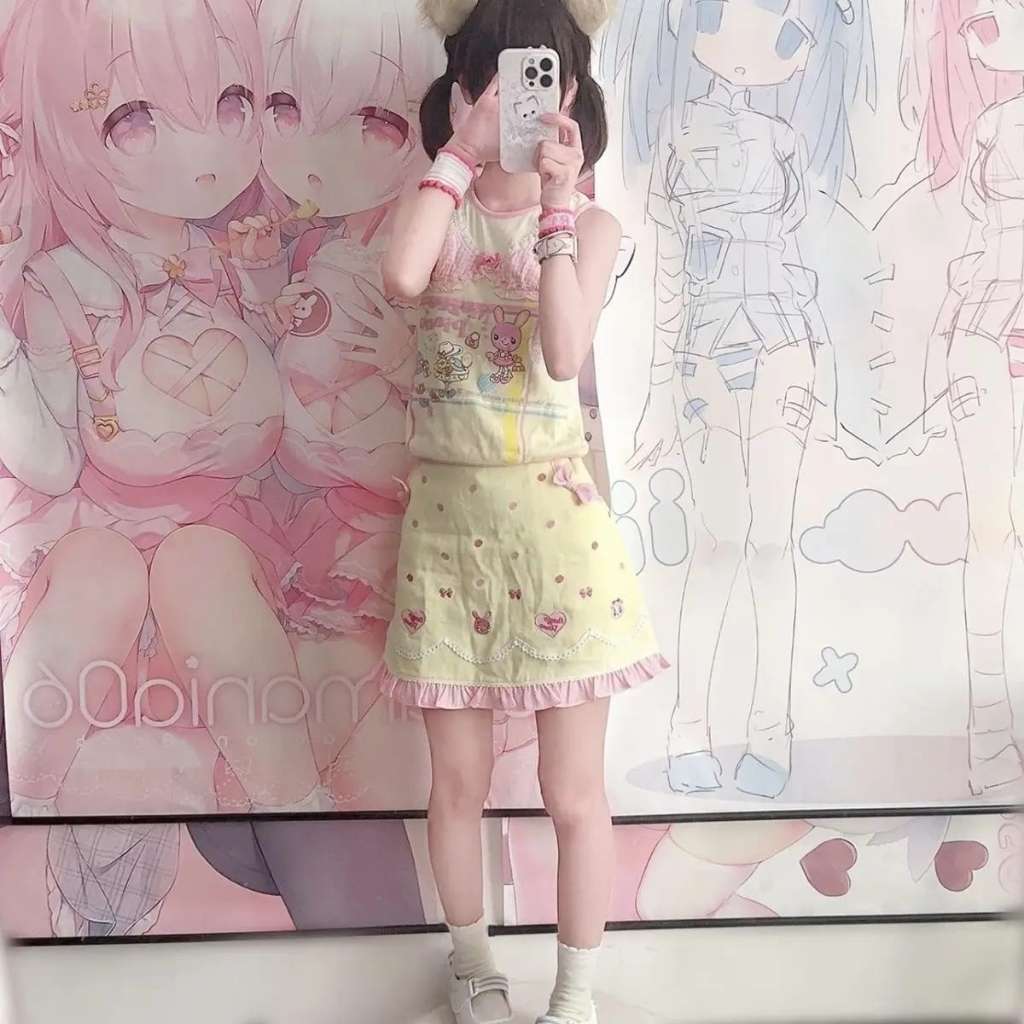 Kawaii pastel skirt with yellow ribbons, animal tails, and smiley face details