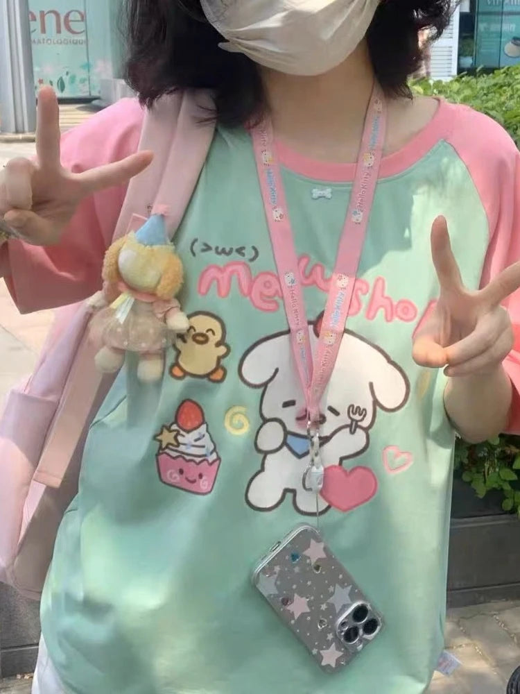 Sweet Paws oversized tee featuring cat and bakery artwork