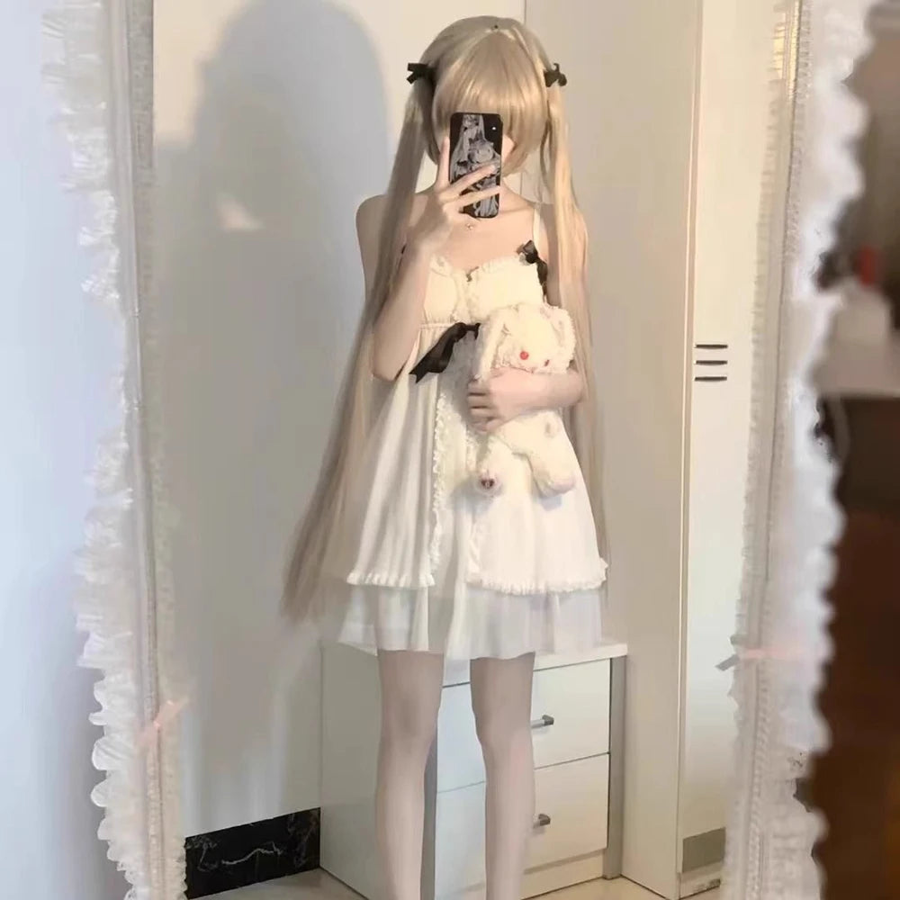 soft pastel Lolita nightdress with layered frills and bows for cozy little-space fantasy evenings