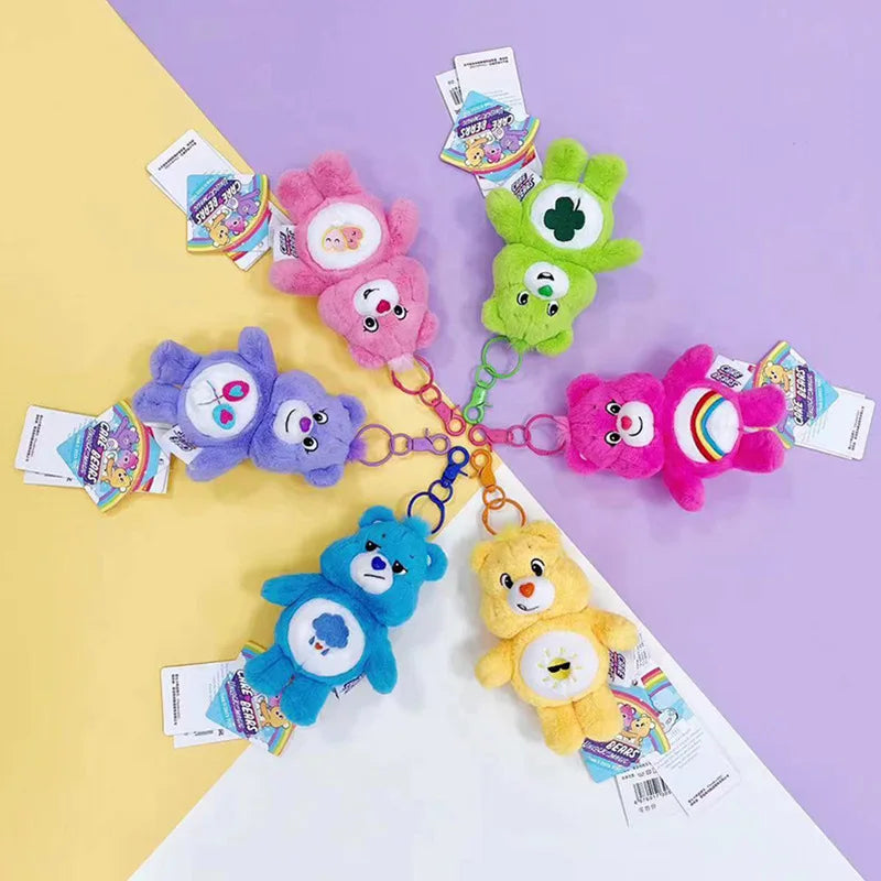 Teddy Cloud Crew plush keychains displayed together showcasing six color variants including purple, red, yellow, blue, pink, and green